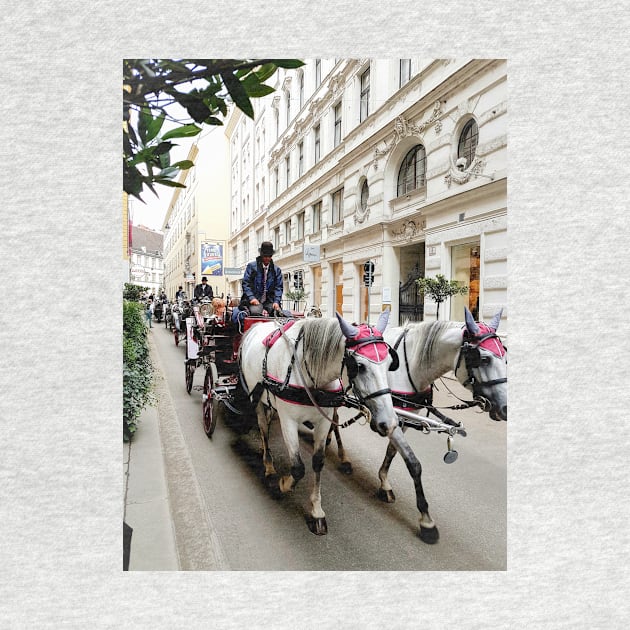 White horses adorned in formal regalia pulling carriages in city street. by brians101